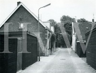 Een doorkijkje in het dwarsstraatje van de Tuinstraat naar de Goudastraat zoals het vroeger was.
Trefwoorden: Tuinstraat - Goudastraat